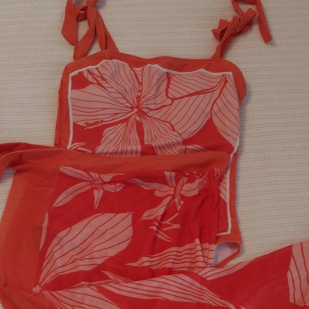 One piece swimsuit with skirt wrap